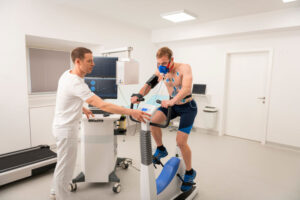 a doctor oversees a patient taking an exercise stress test